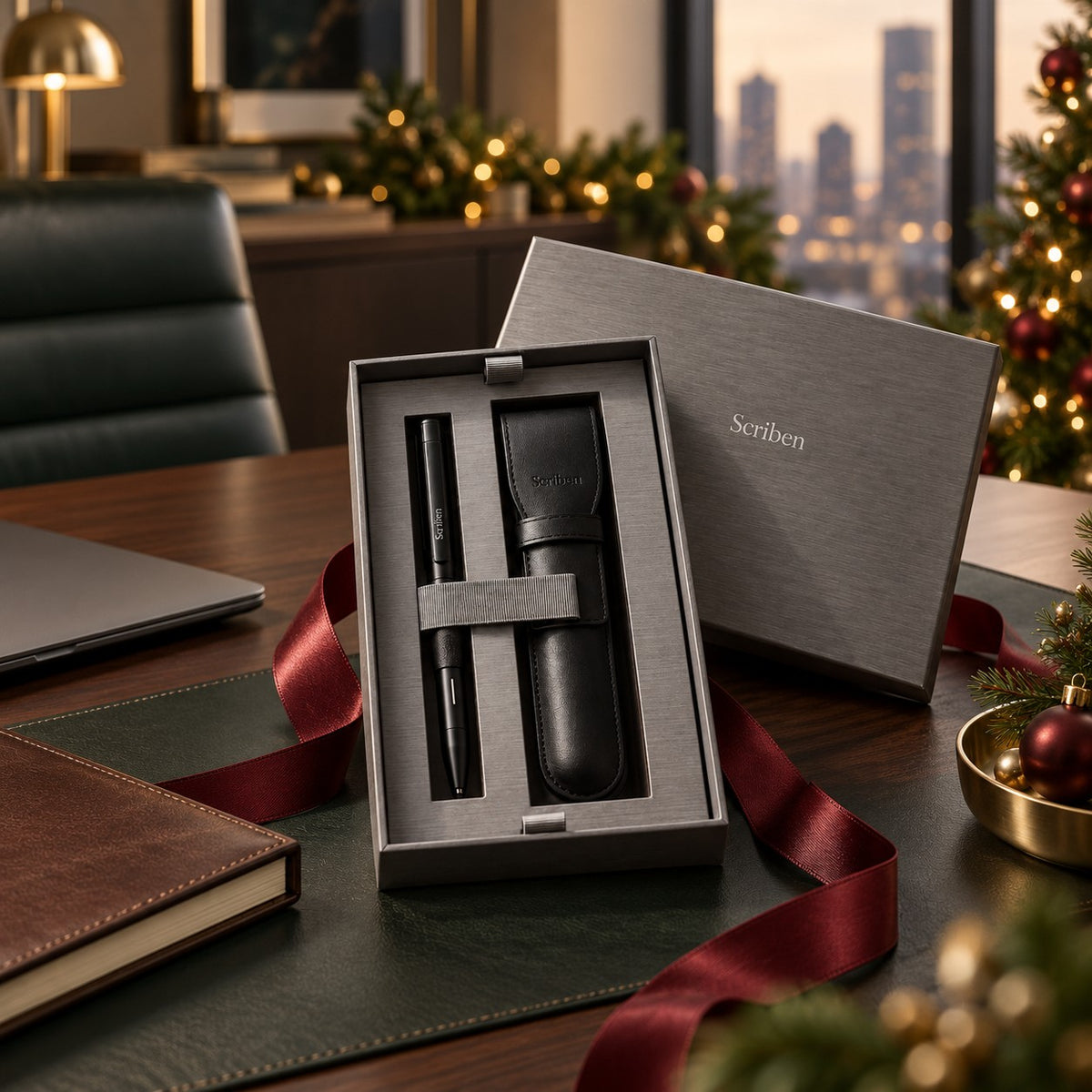 Open Scriben gift box on an executive desk with a holiday tree and city view